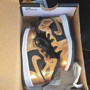 Jordan Gold and Black High-Top Sneakers